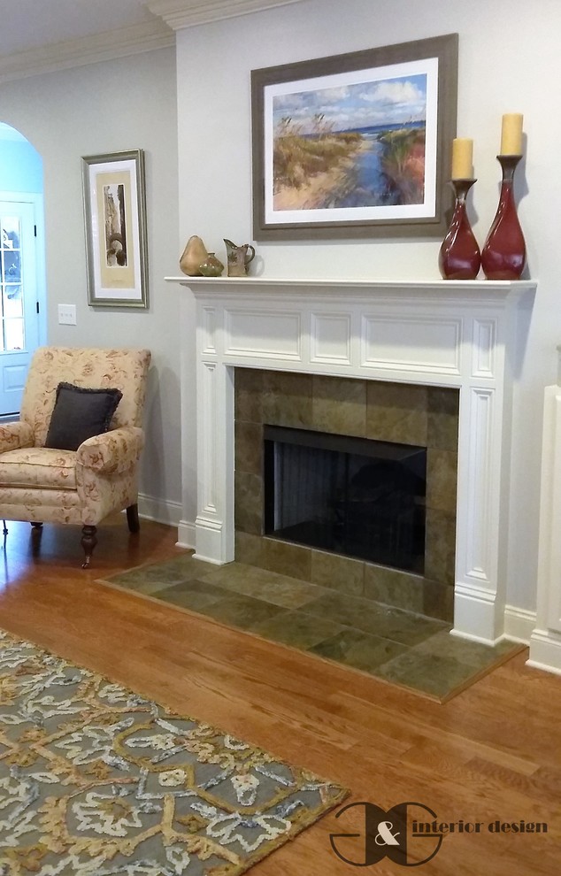 Medium sized traditional open plan living room in Atlanta with grey walls, medium hardwood flooring, a standard fireplace, a tiled fireplace surround and a wall mounted tv.