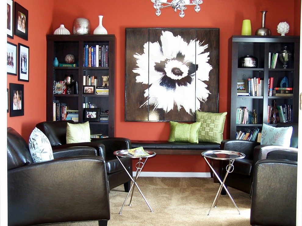 Immagine di un soggiorno minimal con pareti rosse