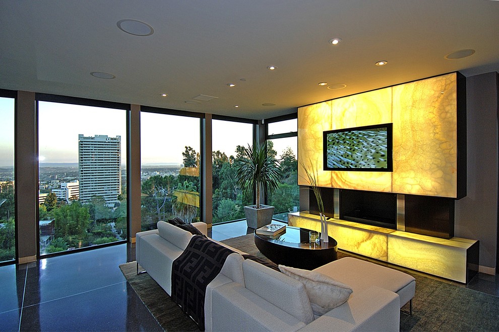 Photo of a medium sized contemporary living room in Los Angeles with a built-in media unit.