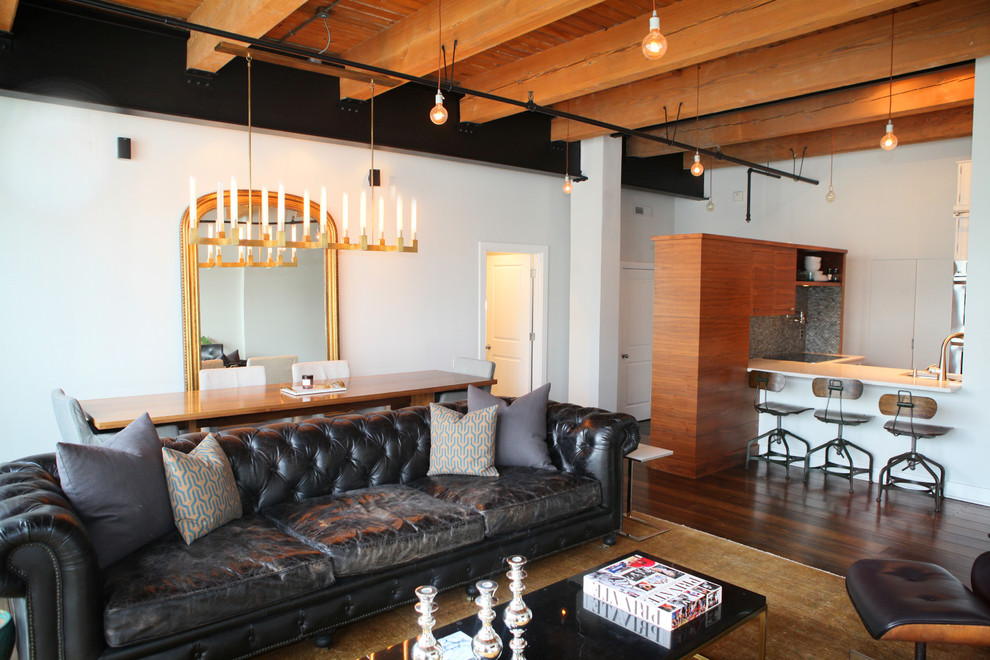 Living room - industrial dark wood floor and brown floor living room idea in Indianapolis with white walls