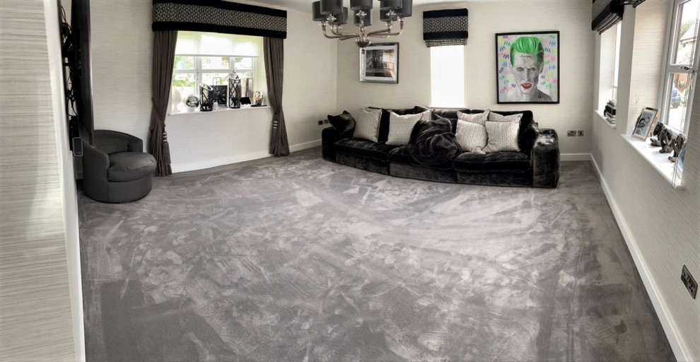 Immagine di un grande soggiorno contemporaneo con moquette e pavimento grigio