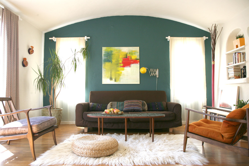 Living room - eclectic living room idea in Los Angeles with white walls