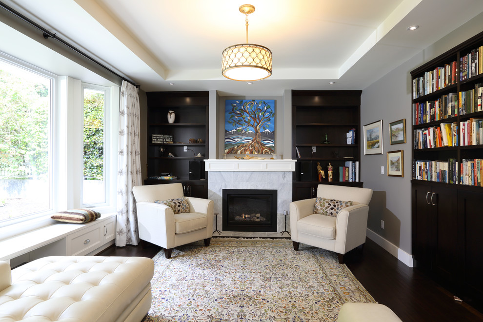 Inspiration for a traditional living room in Vancouver with grey walls.