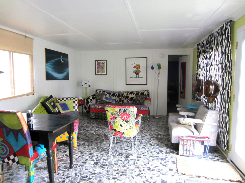 Example of an eclectic living room design in Charlotte