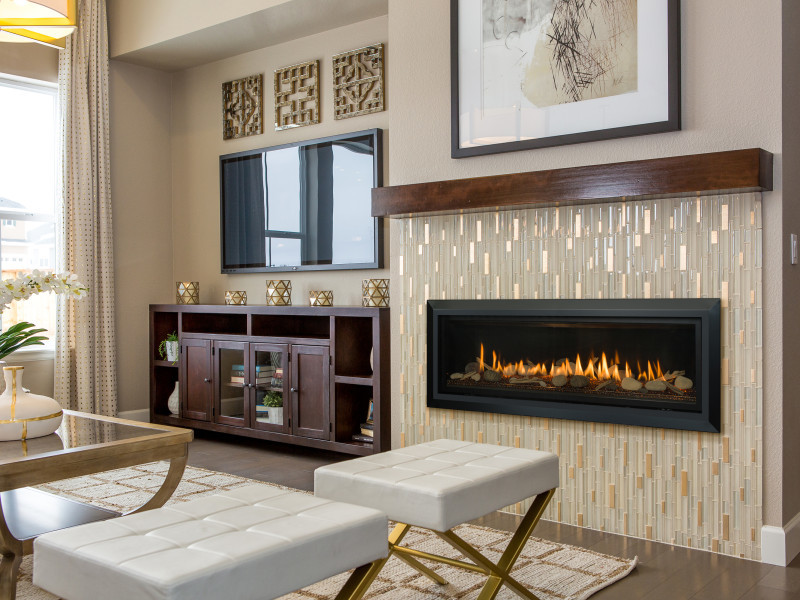 Example of a mid-sized trendy formal and enclosed gray floor living room design in New York with beige walls, a ribbon fireplace, a tile fireplace and a wall-mounted tv