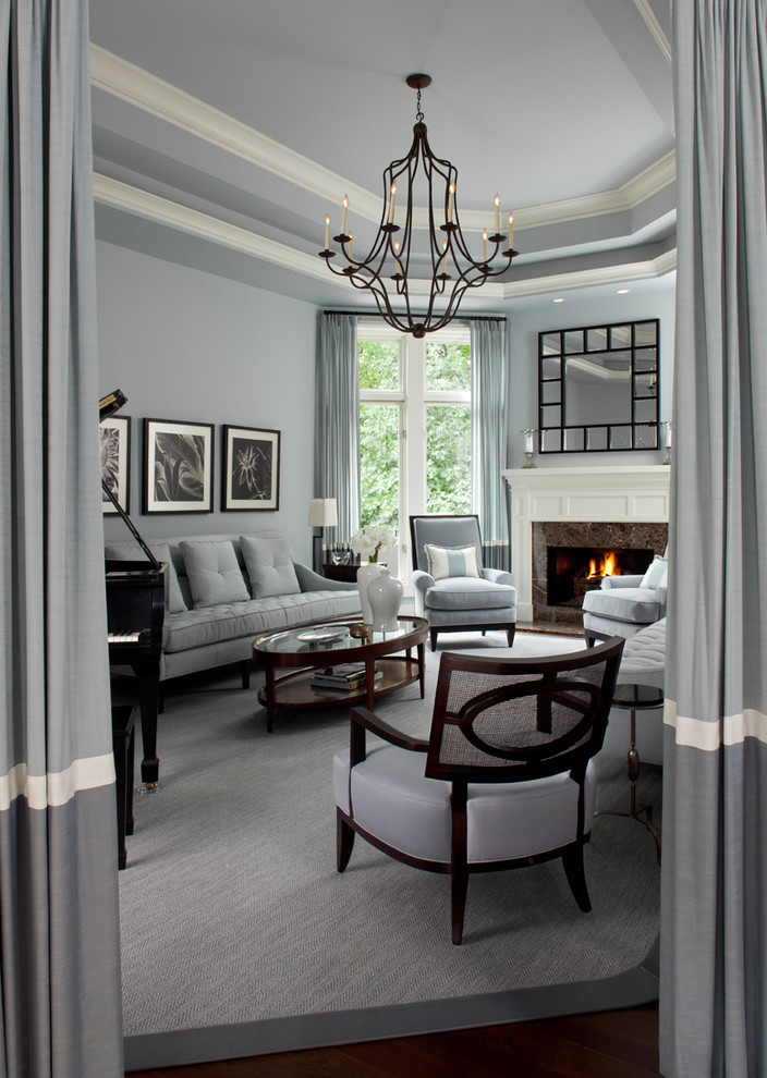 Trendy living room photo in Detroit with a music area, a standard fireplace and gray walls