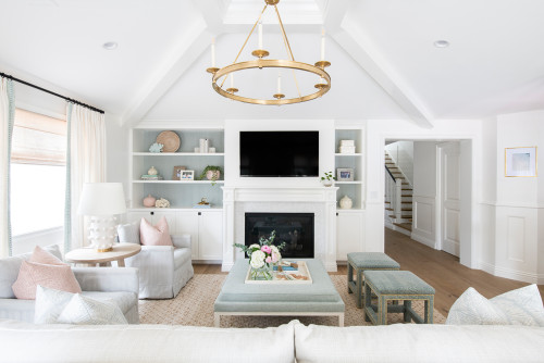cottage living room with hanging gold chandelier