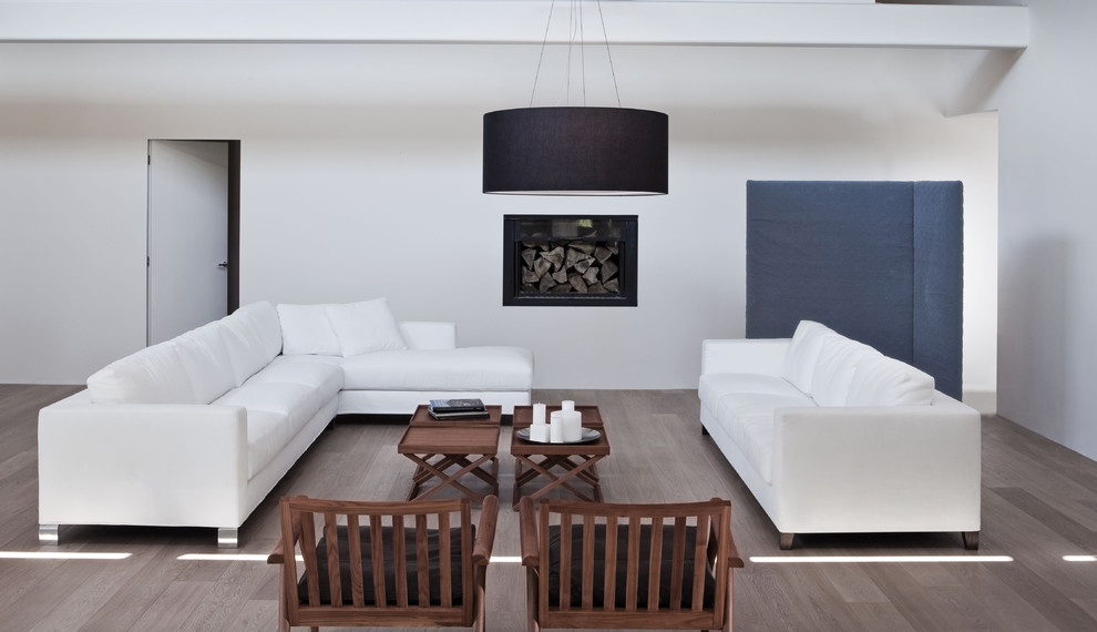 Photo of a modern living room in Philadelphia with white walls.