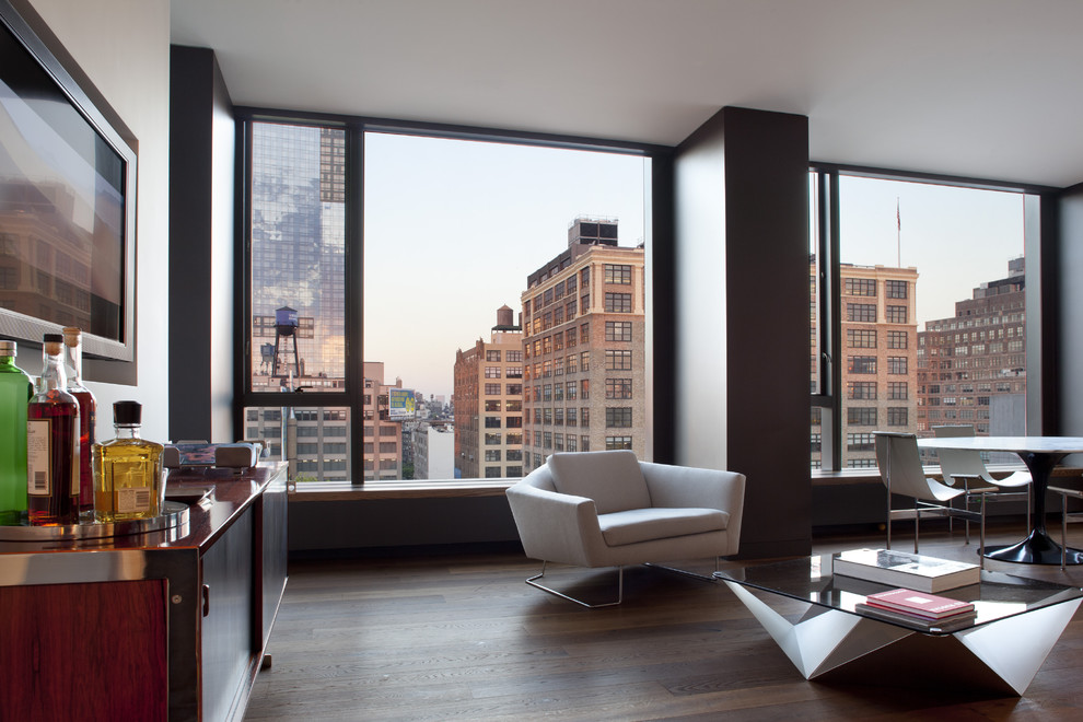 Inspiration for a modern living room remodel in San Francisco with a media wall