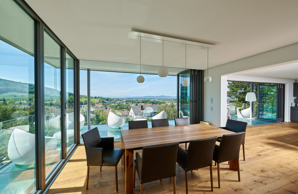 Photo of a modern dining room in Hertfordshire.