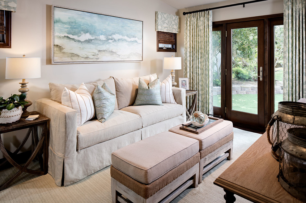 Example of a small beach style carpeted living room design in San Diego with beige walls