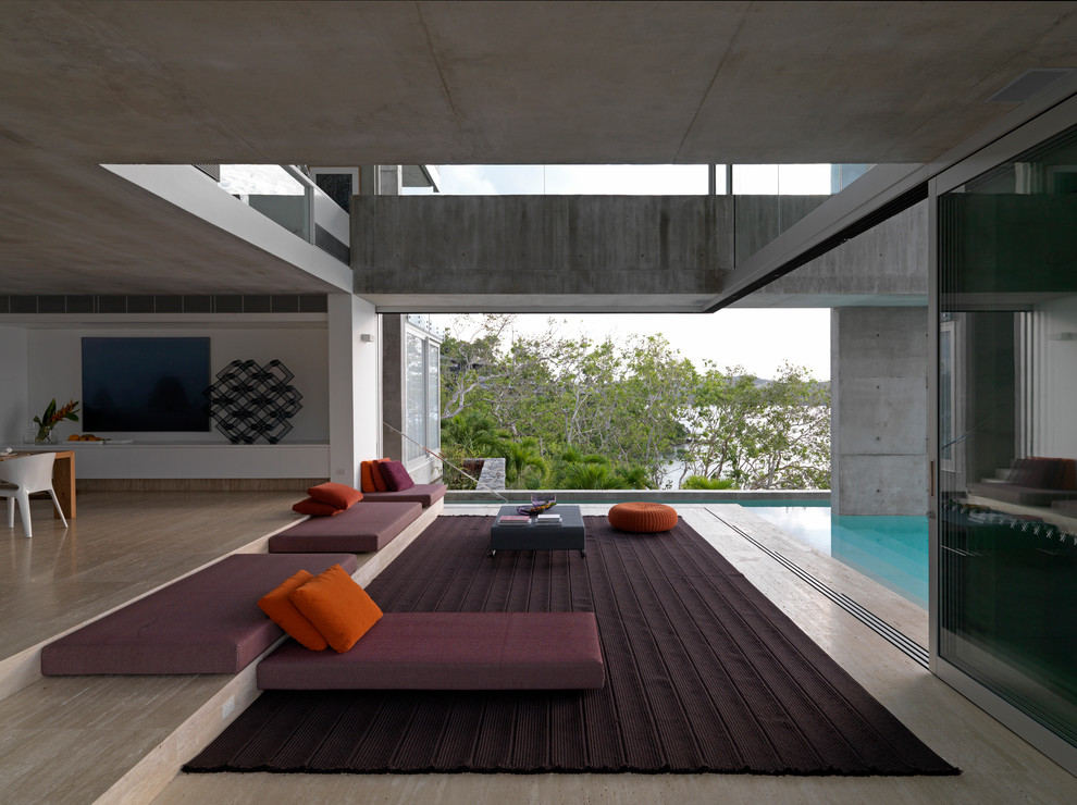 Свежая идея для дизайна: огромная открытая гостиная комната в стиле лофт с серыми стенами, бетонным полом и серым полом без телевизора - отличное фото интерьера
