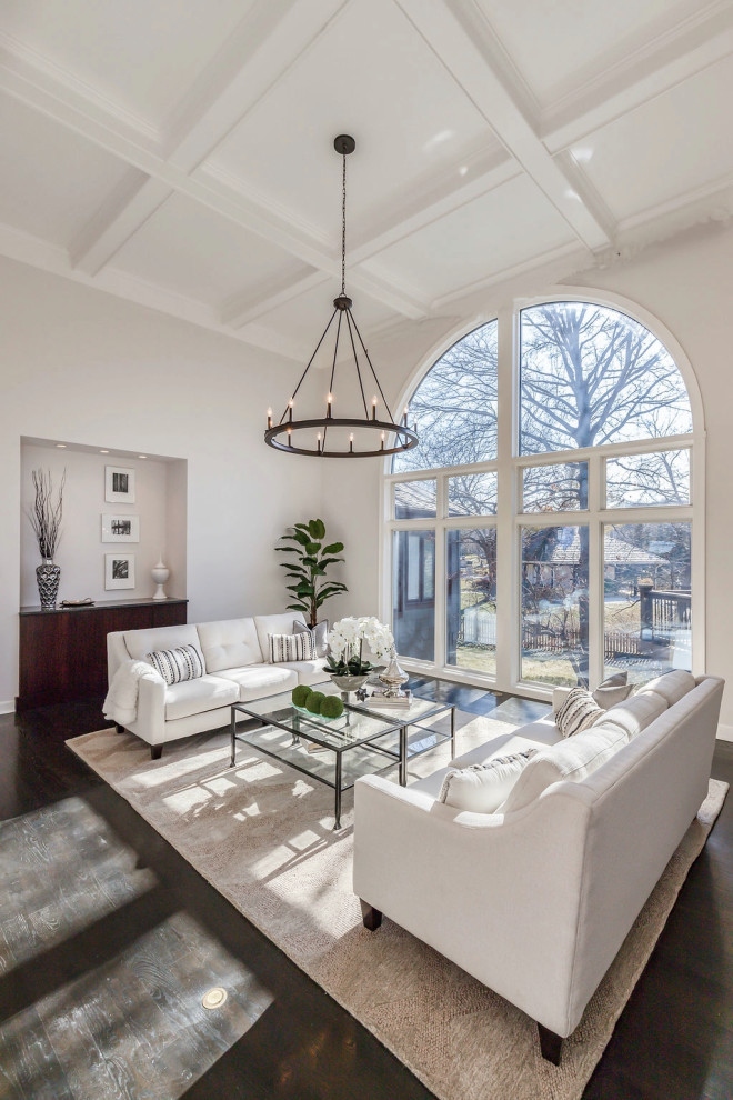 Inspiration for a large transitional formal and open concept dark wood floor, brown floor and coffered ceiling living room remodel in Kansas City with gray walls and no tv
