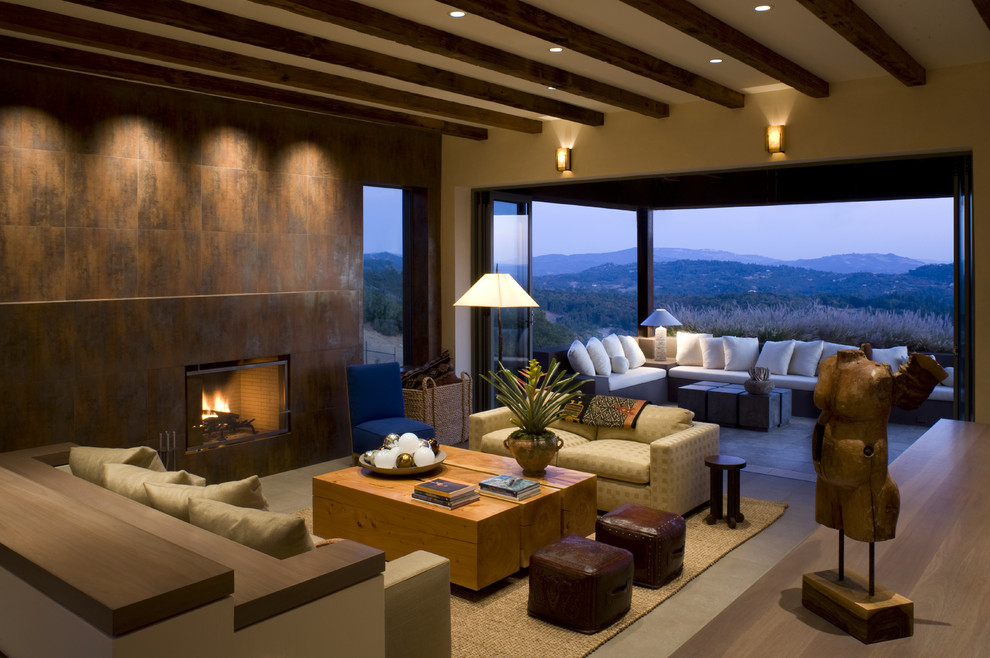 Contemporary formal open plan living room in San Francisco with a ribbon fireplace and a tiled fireplace surround.