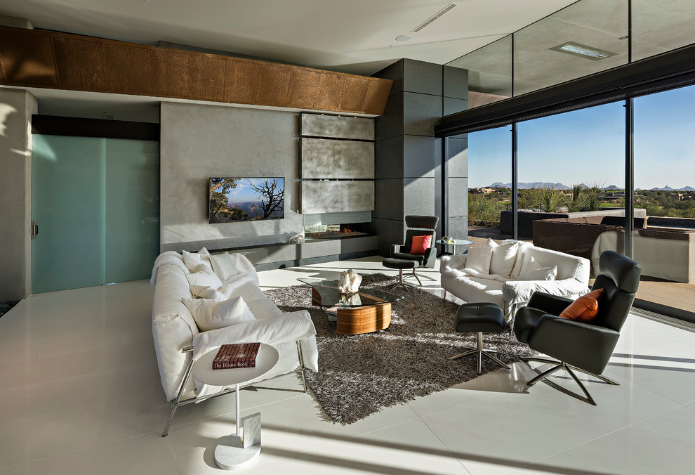 Foto di un grande soggiorno minimalista stile loft con pareti grigie, pavimento con piastrelle in ceramica e nessun camino