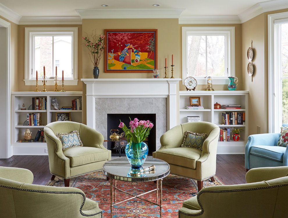 Elegant dark wood floor and brown floor living room photo in Chicago with beige walls and a standard fireplace