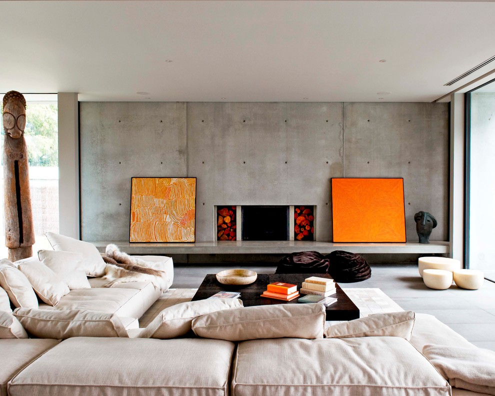 Design ideas for a contemporary formal living room in Melbourne with a concrete fireplace surround, no tv and a ribbon fireplace.