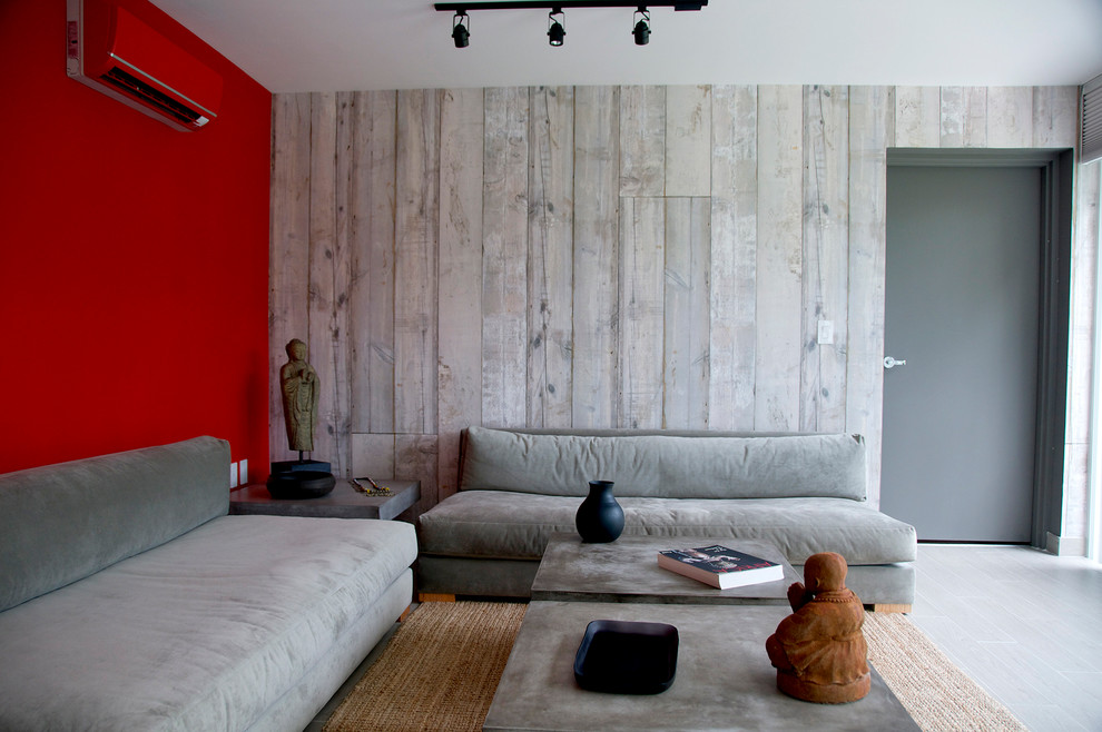 Contemporary living room in Miami with grey walls.