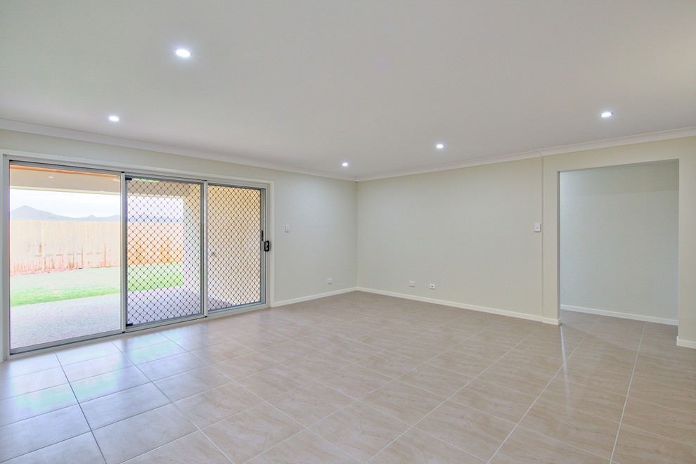 Mid-sized loft-style living room photo in Brisbane
