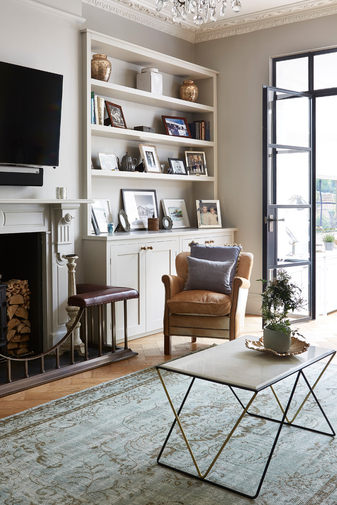 Living room - industrial living room idea in London