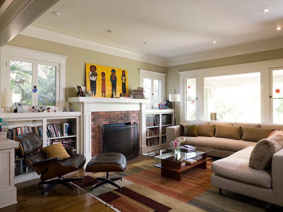 Minimalist enclosed living room photo in Portland with a standard fireplace, a brick fireplace and no tv