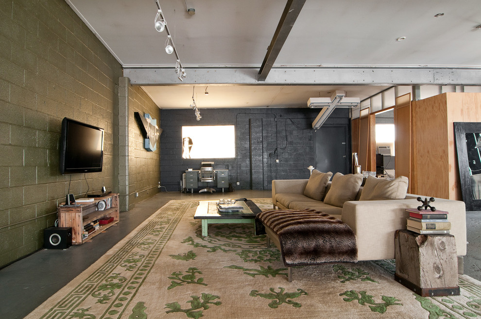 Urban open concept living room photo in Salt Lake City with a wall-mounted tv