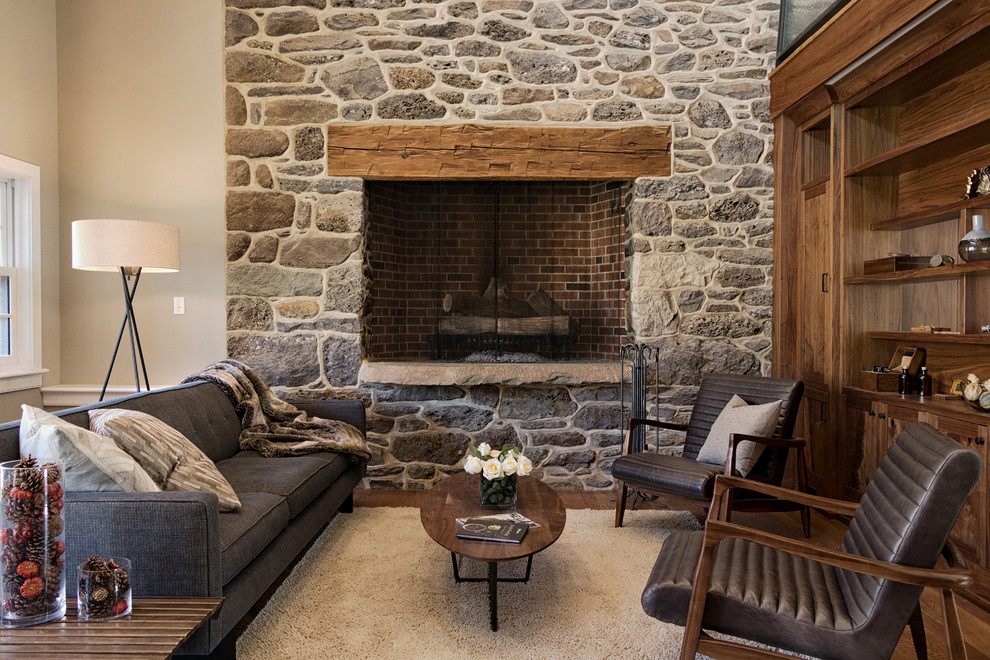 Inspiration for a timeless living room remodel in Philadelphia with a standard fireplace and a brick fireplace