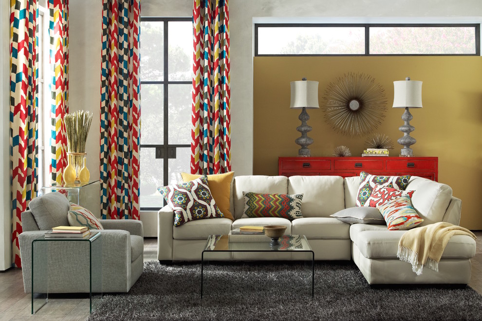 Inspiration for an eclectic living room remodel in Other with yellow walls
