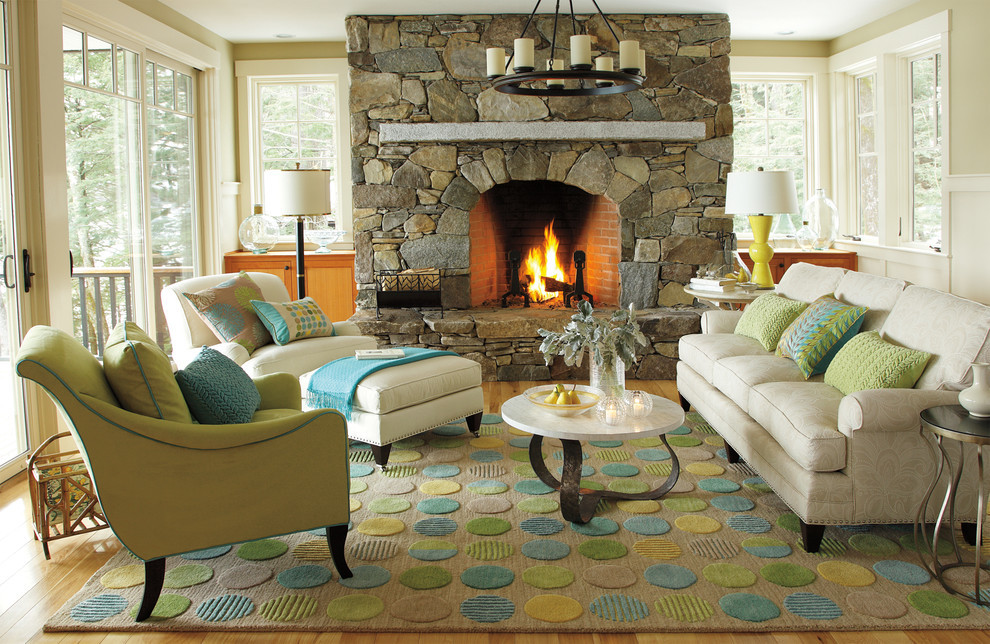 Example of a classic living room design in Other with a standard fireplace and a brick fireplace