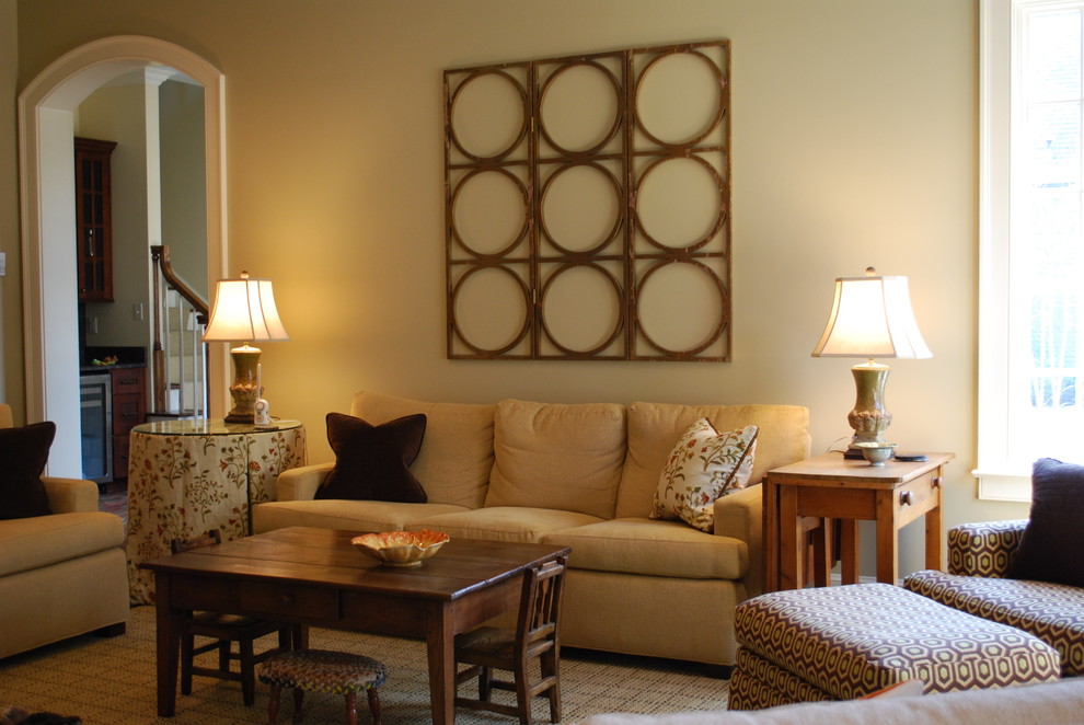 Example of a classic living room design in Other with beige walls