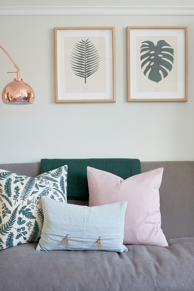 Immagine di un soggiorno minimalista con pareti grigie