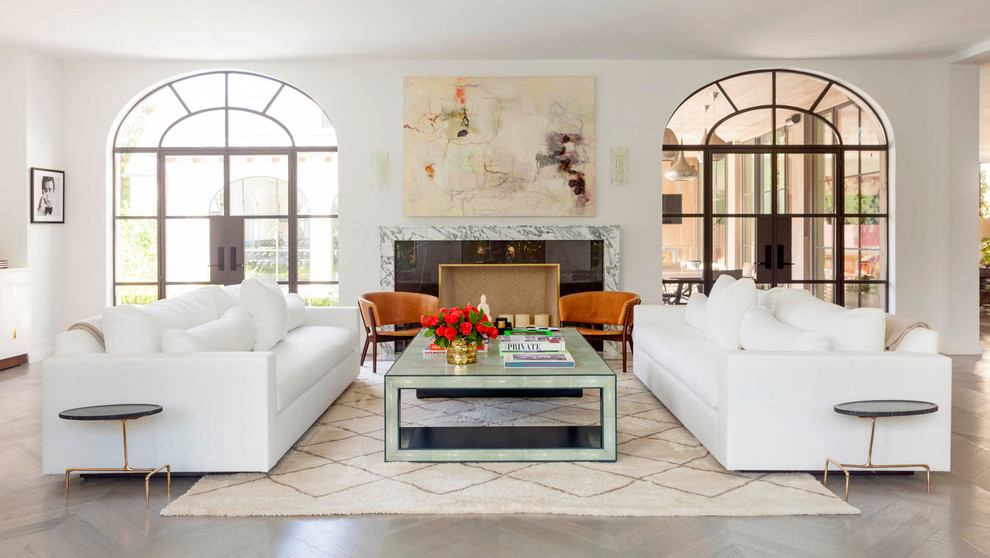 Example of a transitional formal and open concept light wood floor and beige floor living room design in Dallas with white walls, a standard fireplace and a stone fireplace