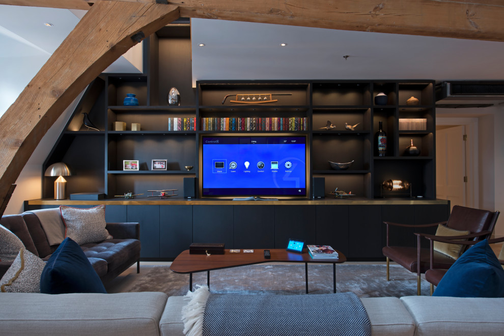 Immagine di un soggiorno contemporaneo di medie dimensioni e chiuso con TV a parete