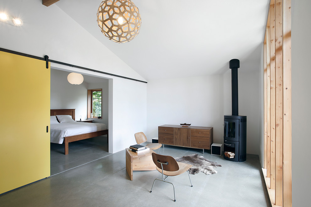Источник вдохновения для домашнего уюта: маленькая гостиная комната в стиле ретро с бетонным полом для на участке и в саду