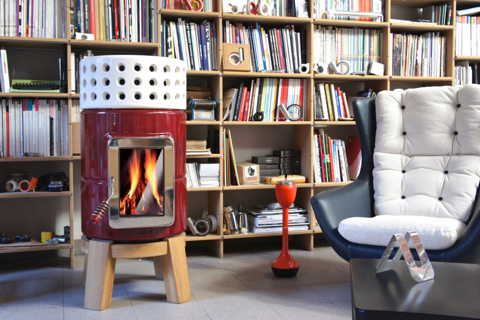 Modelo de biblioteca en casa escandinava pequeña con suelo de linóleo, estufa de leña, marco de chimenea de hormigón y suelo blanco