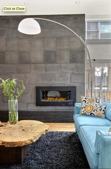This is an example of a modern grey and teal living room in Denver.
