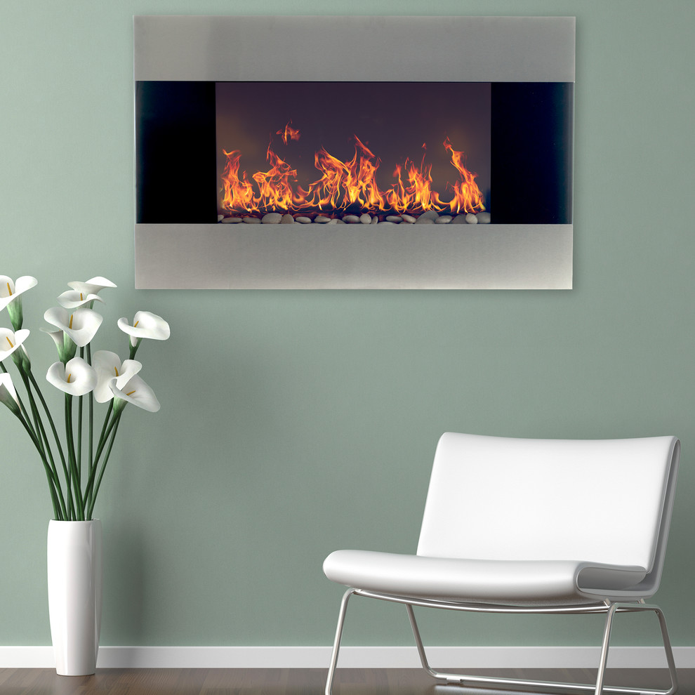 クリーブランドにある中くらいなコンテンポラリースタイルのおしゃれなリビング (緑の壁、吊り下げ式暖炉、金属の暖炉まわり) の写真