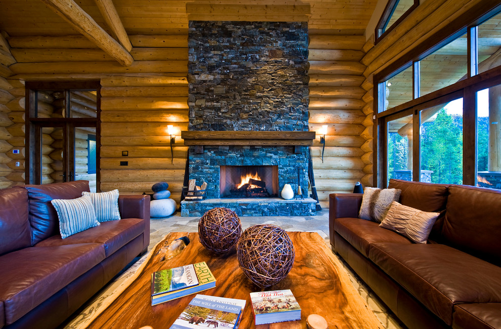 Inspiration for a traditional living room in Vancouver with a standard fireplace and a stone fireplace surround.