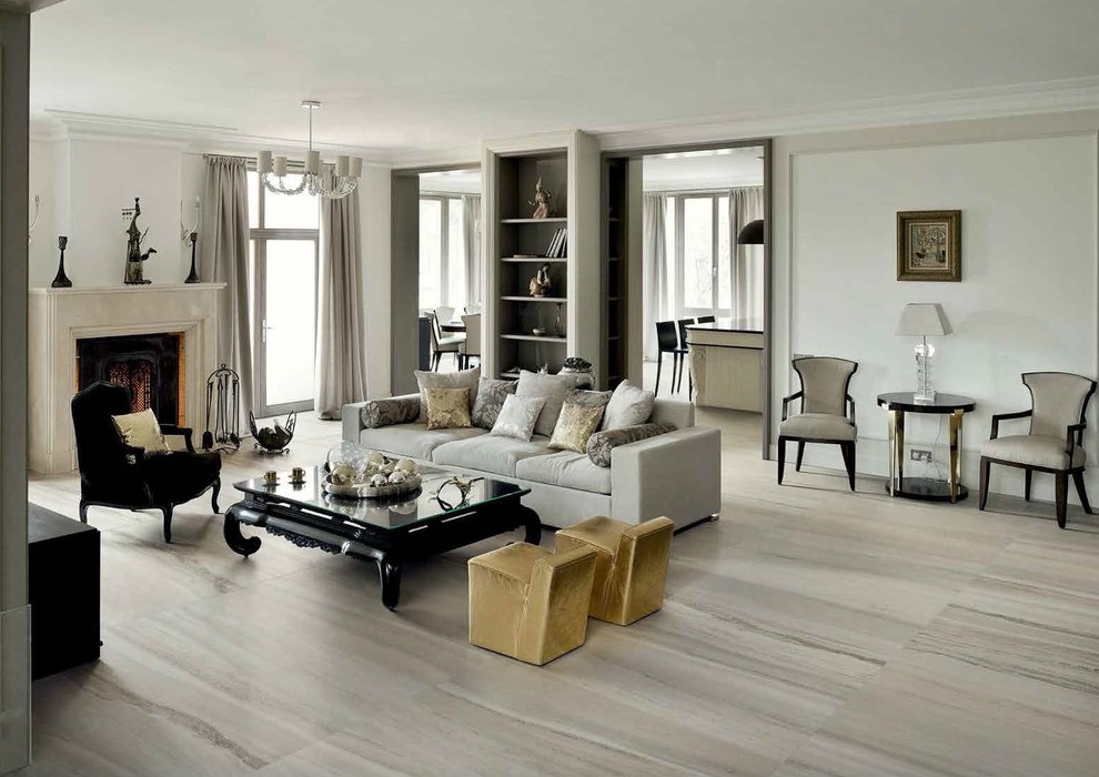 Foto di un soggiorno minimalista con pavimento in gres porcellanato e camino classico