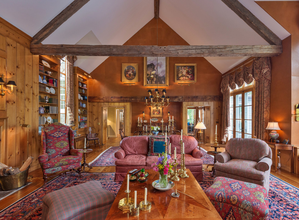 Immagine di un soggiorno country aperto con sala formale e pavimento in legno massello medio