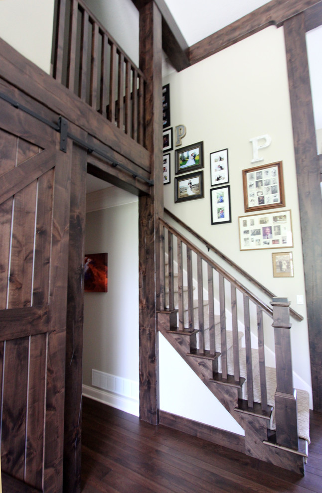 Photo of a large rustic staircase in Cleveland.