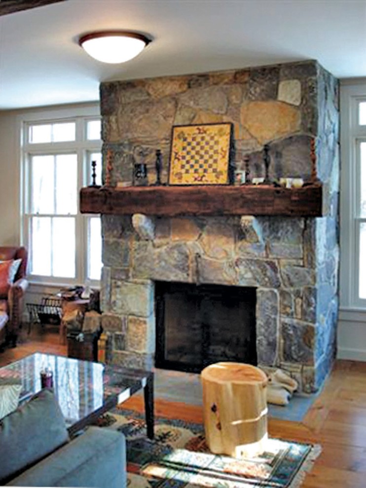Example of a country living room design in Burlington