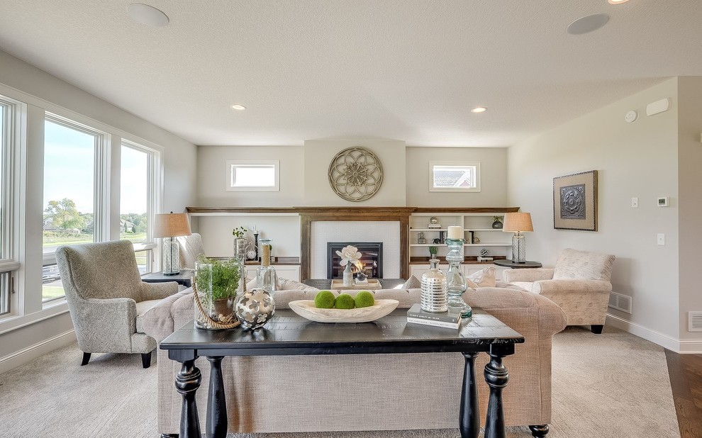 Living room - mid-sized transitional open concept carpeted and gray floor living room idea in Minneapolis with gray walls, a standard fireplace and a tile fireplace
