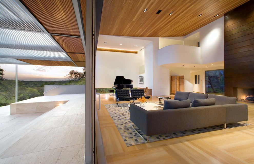 Inspiration for an expansive contemporary living room in Austin with a music area.