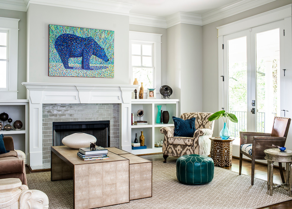 Large classic living room in Atlanta with white walls, a standard fireplace and a tiled fireplace surround.