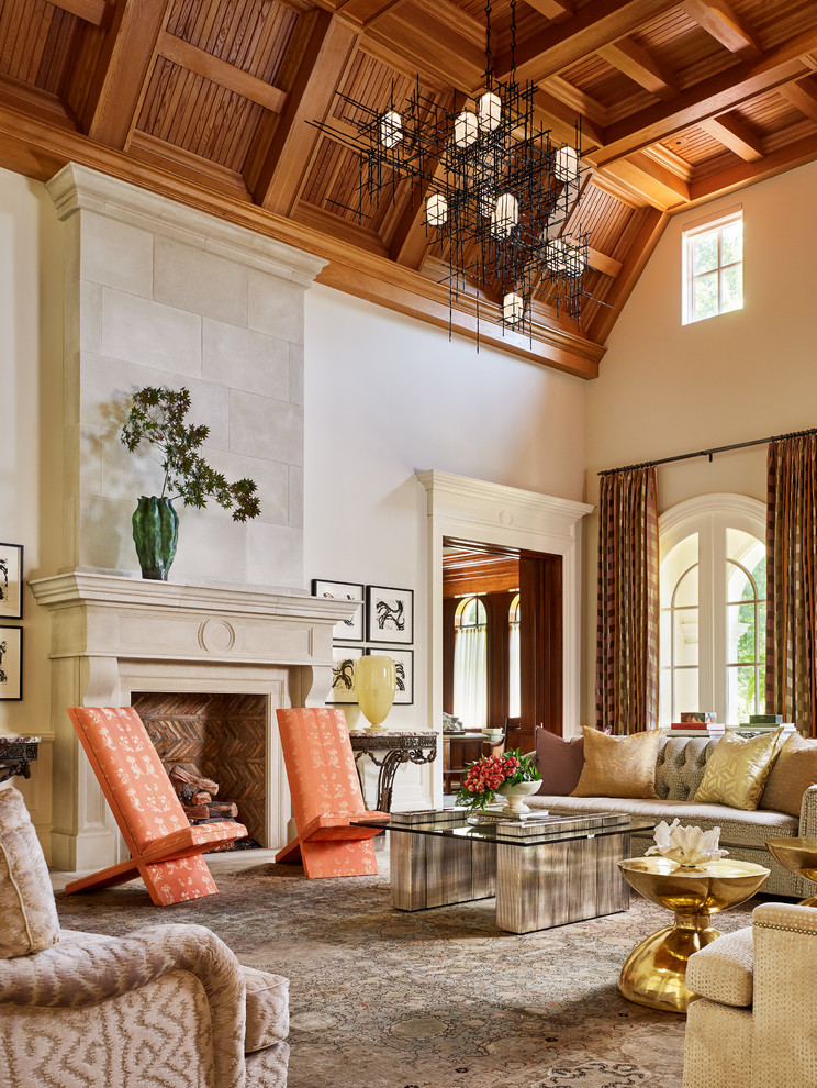 This is an example of a traditional formal enclosed living room in Dallas with beige walls and a standard fireplace.