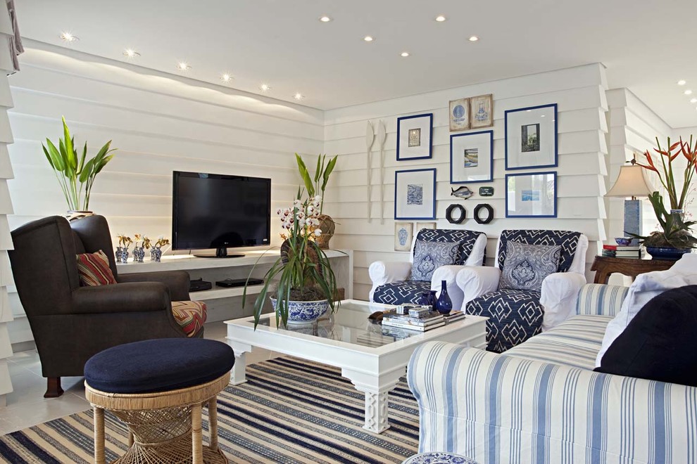 Inspiration for a contemporary living room remodel in Other with white walls and a tv stand
