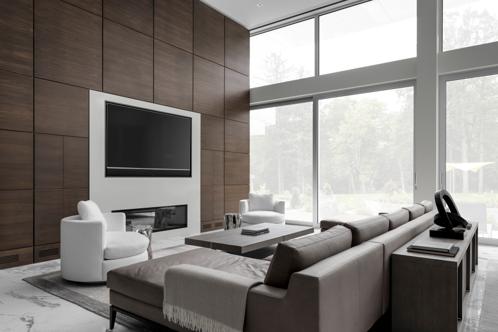Aménagement d'un très grand salon moderne avec un sol en marbre et un sol gris.