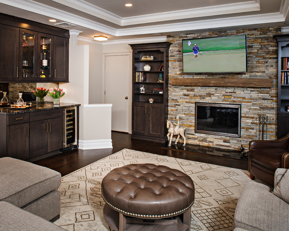 Example of a mid-sized classic formal and open concept dark wood floor living room design in New York with beige walls, a hanging fireplace, a stone fireplace and a wall-mounted tv