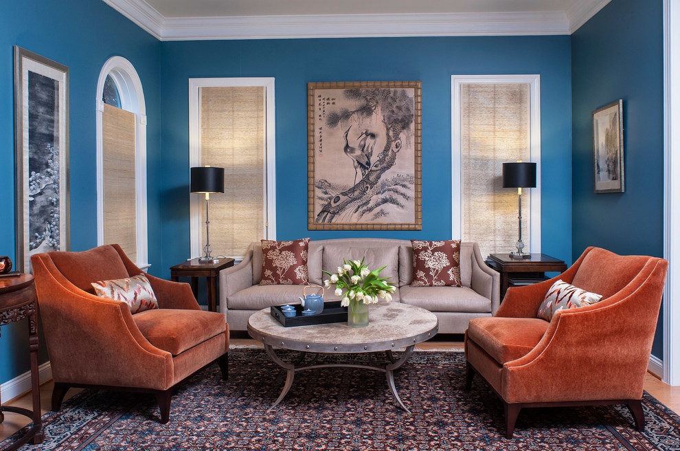 Living room - traditional living room idea in DC Metro with blue walls